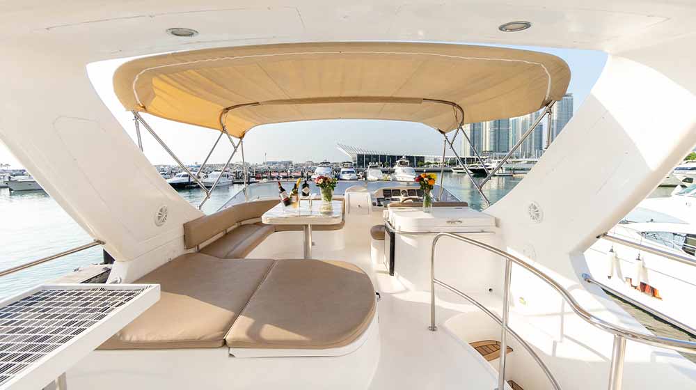 flybridge of luxurious boat with leather seatings, electric bbq, control station